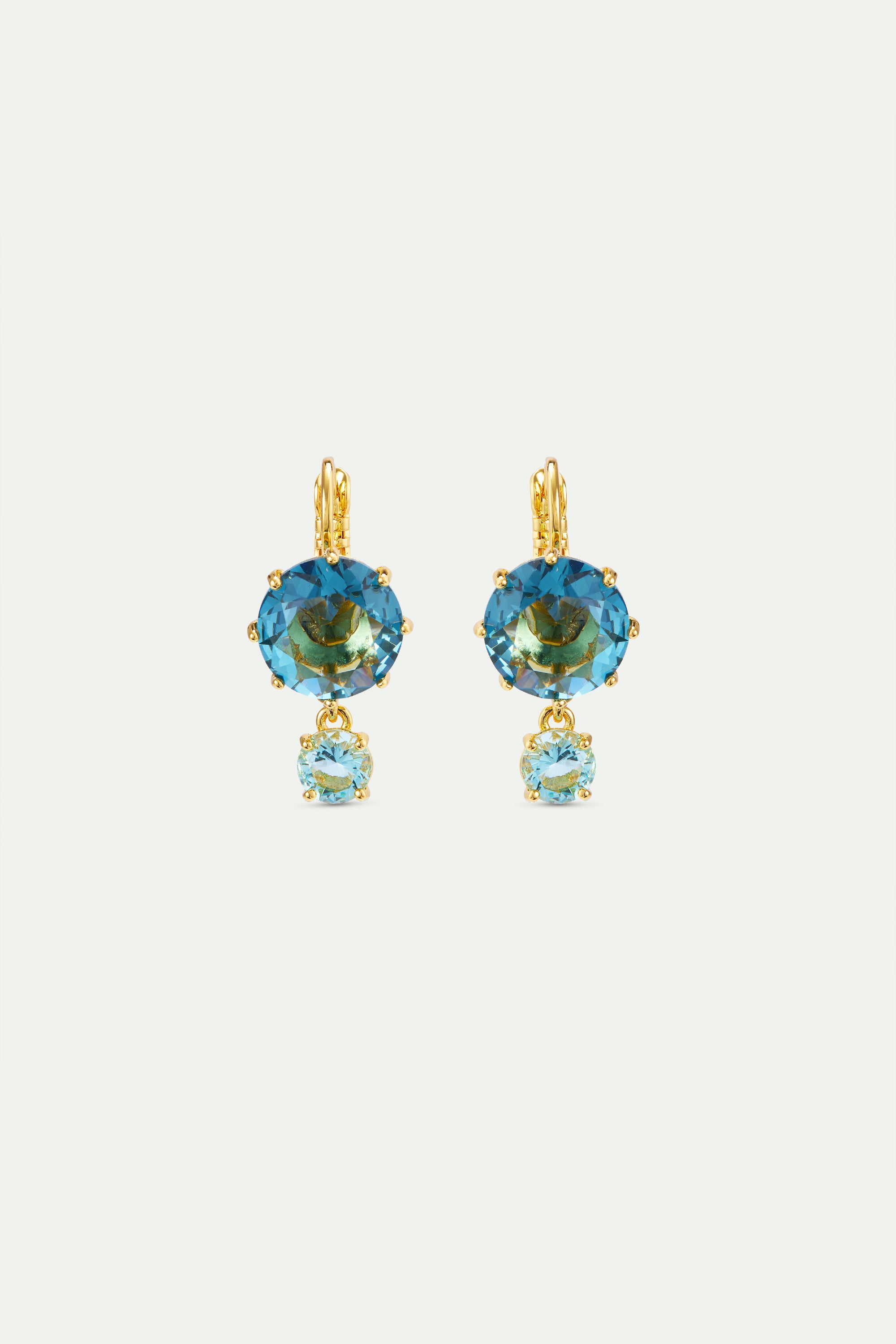 Diamantine sleeper earrings with round acqua azzura stones