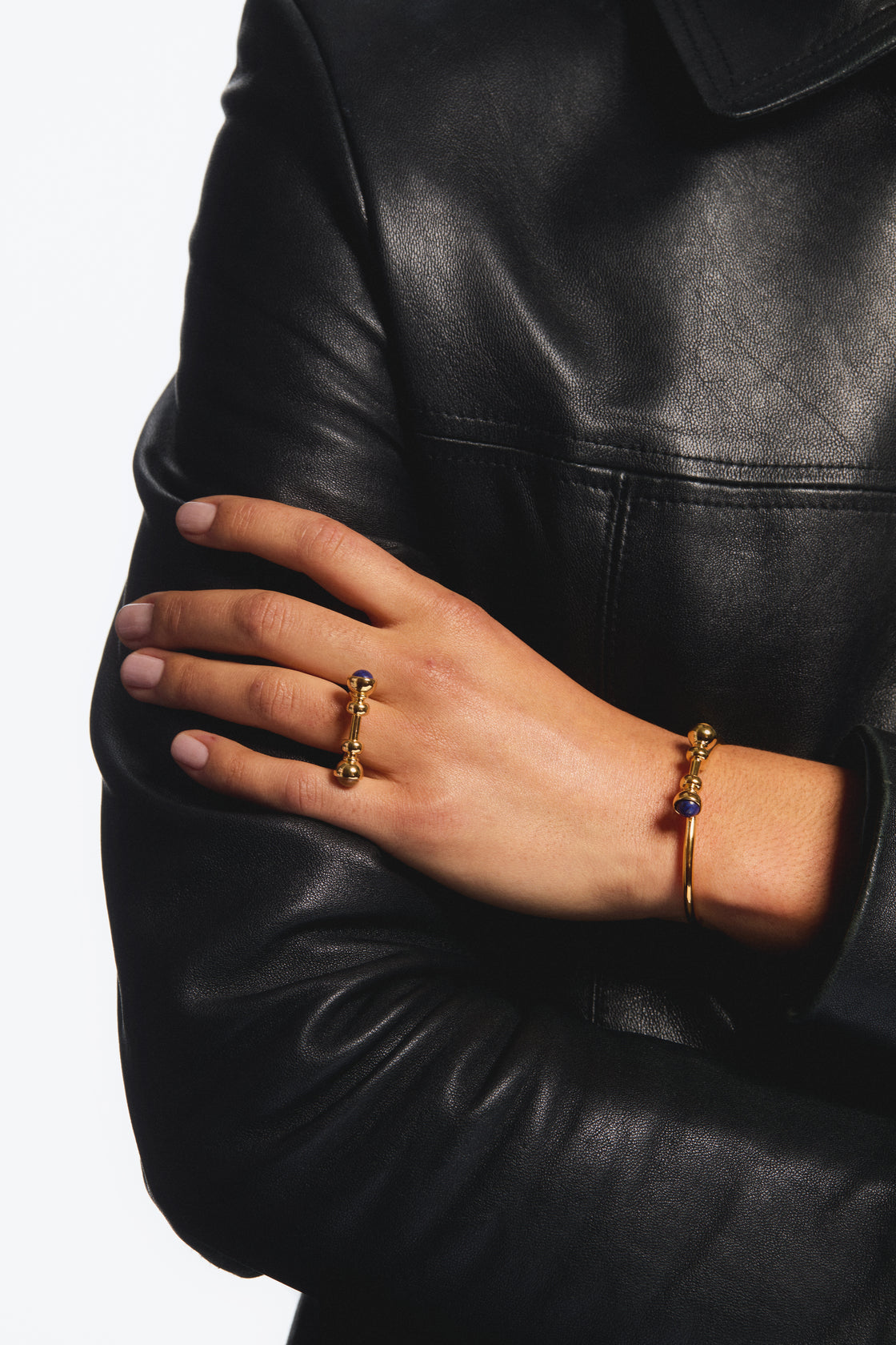 Golden ring with lapis lazuli and jasper beads