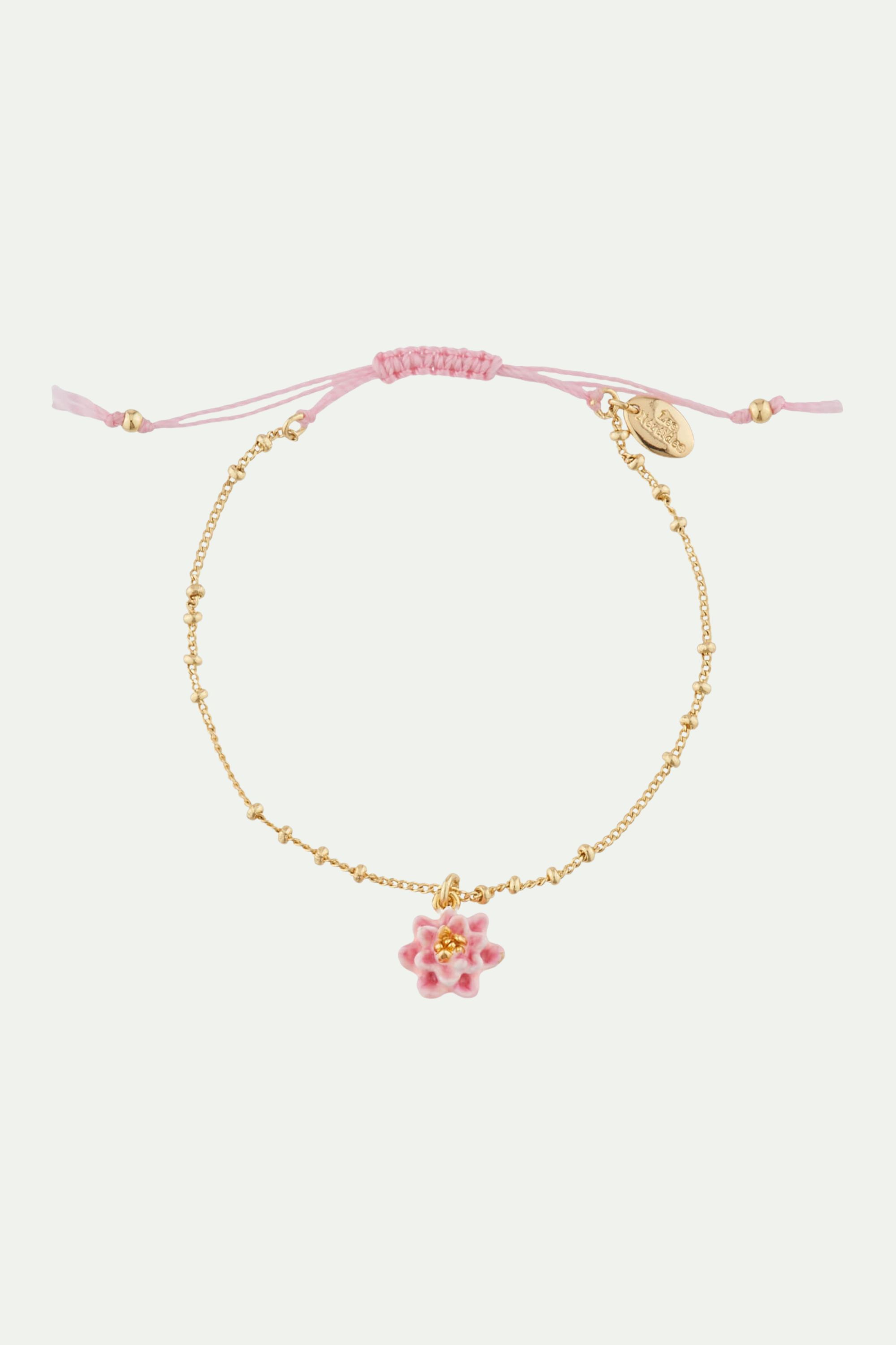 Pulsera fina de loto rosa en latón dorado