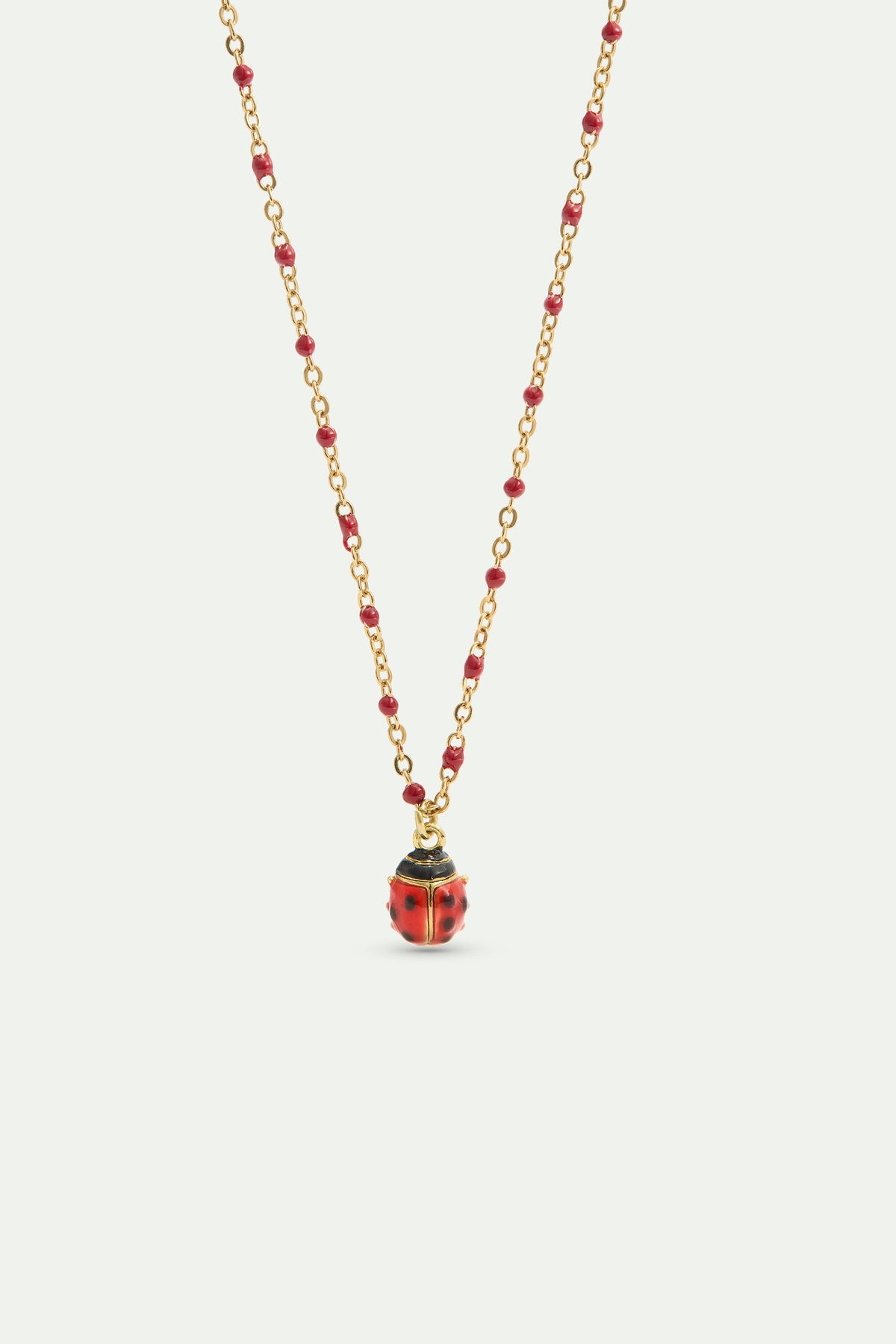 Collar colgante mariquita roja y negra