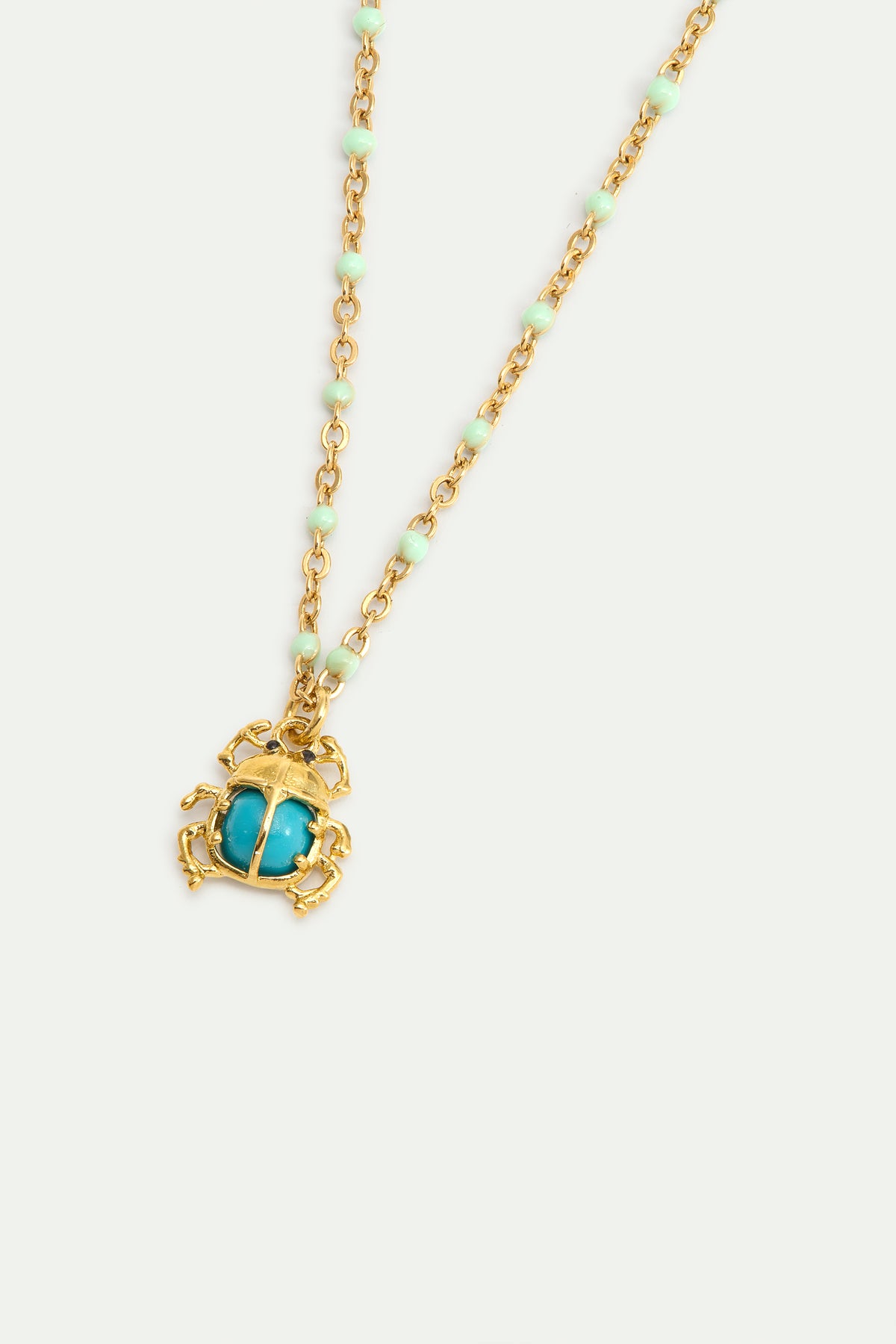 Pulsera fina escarabajo turquesa y dorado