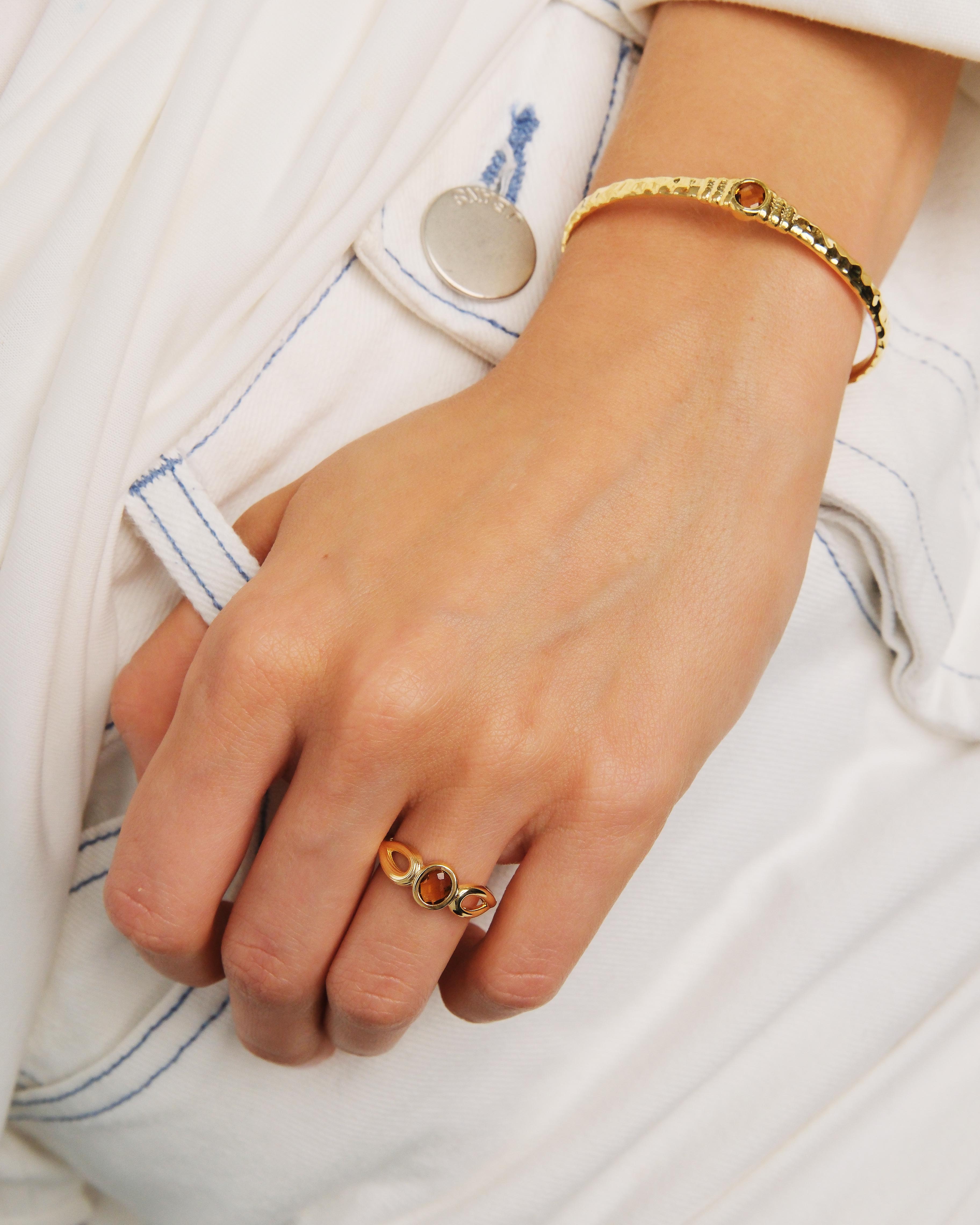 Gold and faceted glass cuff bracelet