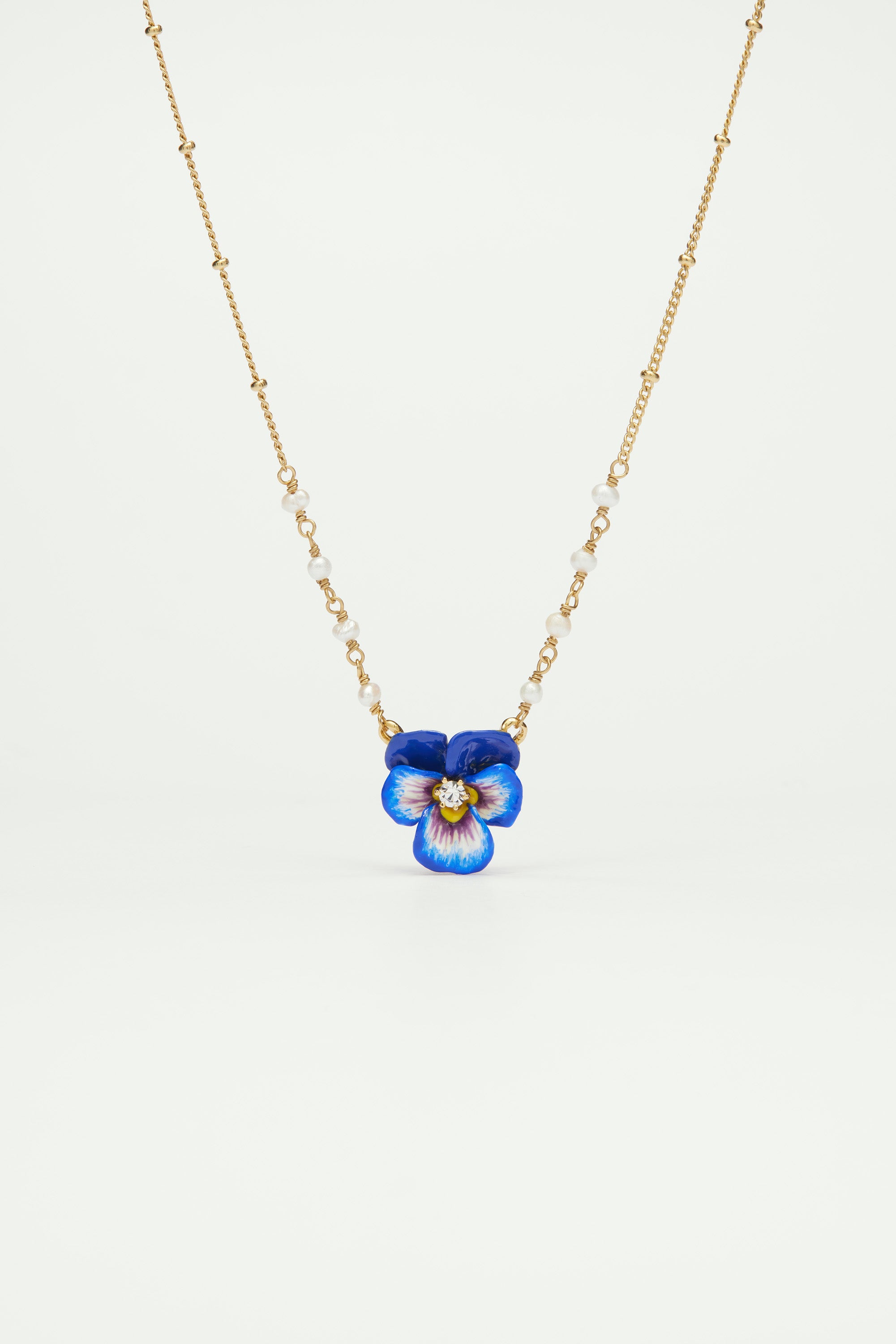 Blue pansy and faceted crystal pendant necklace