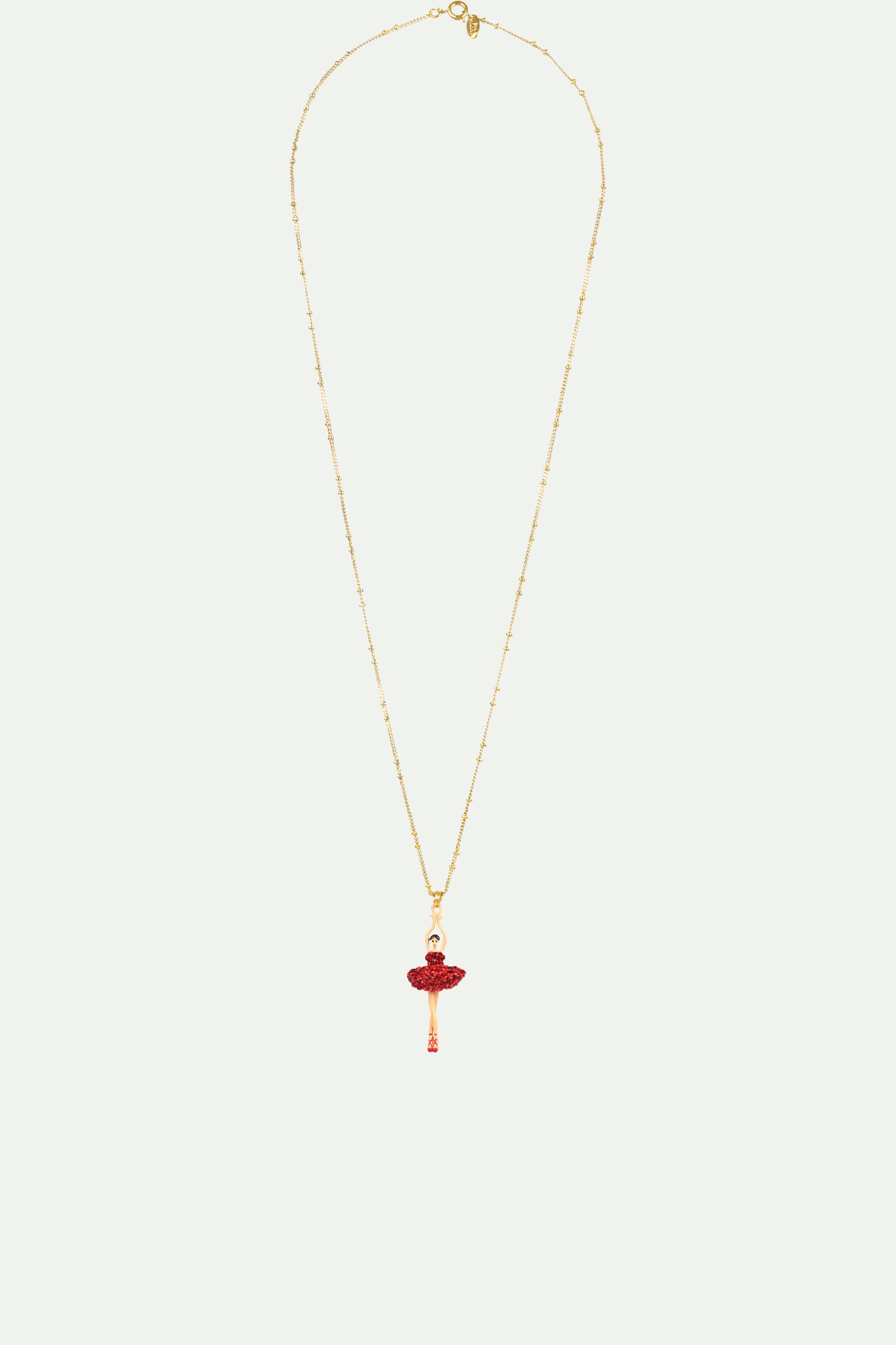 Necklace featuring ballerina with tutu paved with red rhinestone
