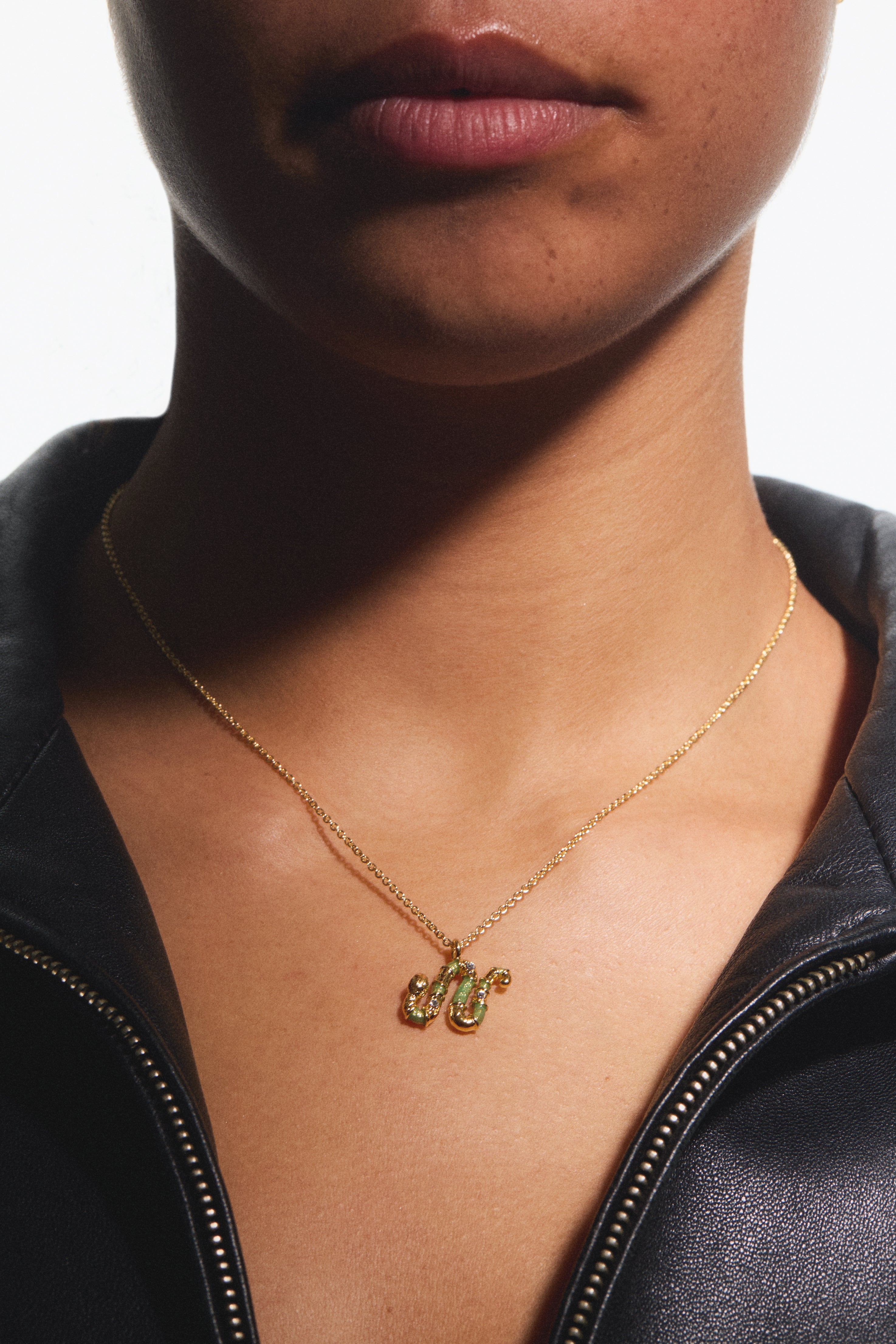 Green snake pendant necklace